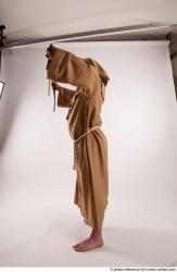 JOEL_ADAMSON WITH CRUCIFIX AND SWORD